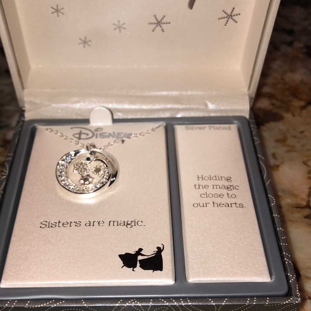 Disney’s Sisters are Magic snowflakes necklace, silver plated.